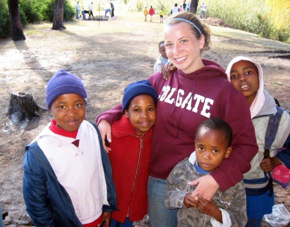 Small helpers coming over to the site of the new community center/orphanage.