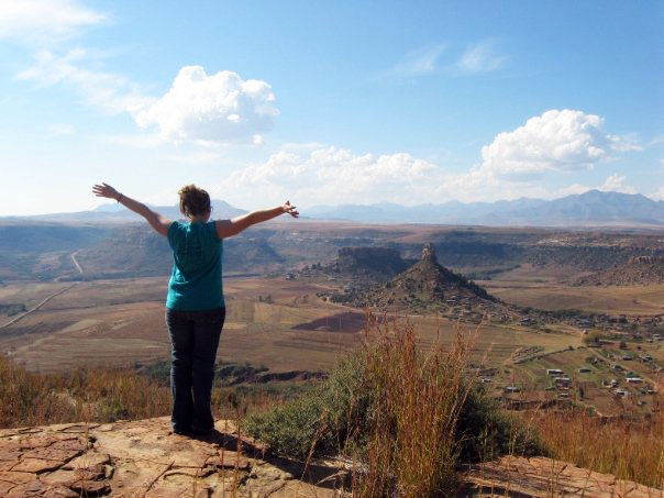 Me, on Thaba-Bosiu, taking it all in. Below is the Qiloane Mountain. Many say that the shape of the mountain is the origin of the iconic Basotho hat. 